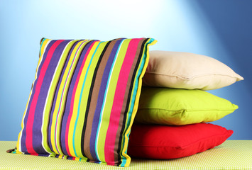 pillows on blue background