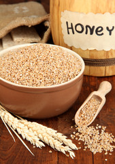 Wheat bran with honey on the table