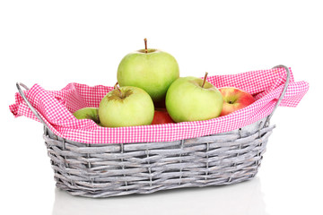 Ripe apples in basket isolated on white