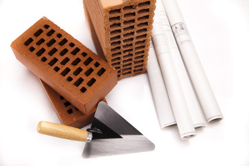 Construction plans and blueprints, bricks