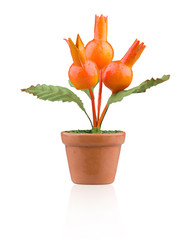 handmade artificial pomegranate flower on white