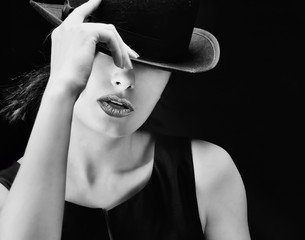 Sexy young pretty retro / vintage woman with a hat