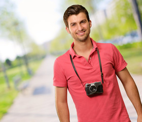Portrait of a man wearing camera