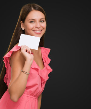 Happy Young Woman Holding Blank Placard