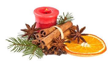 Fototapeta na wymiar christmas decoration with fir branch, candle, cinnamon on white