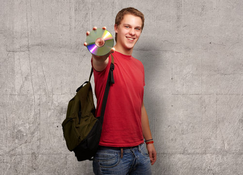 Portrait Of A Man With Compact Disc