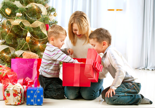 Happy Children With Christmas Gifts