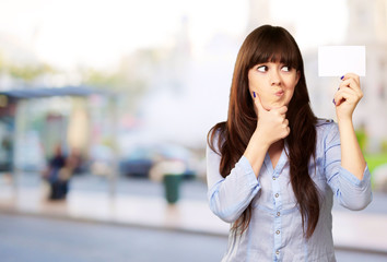 Fototapeta premium Portrait Of A Girl Holding And Making A Pout