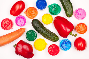 motley paints and vegetables (tomatos, cucumbers, sweet peppers,