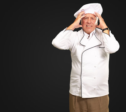 Portrait Of A Chef Having Headache