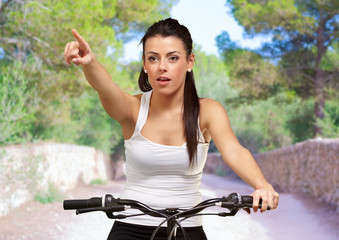 Portrait Of A Young Woman Cycling