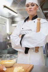 Baker holding rolling pin