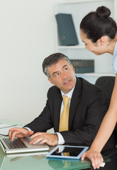 Business man and woman working in team
