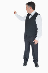 Man showing us something behind him