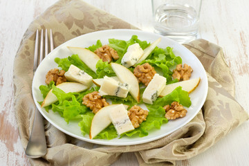 salad with cheese, pears and walnut