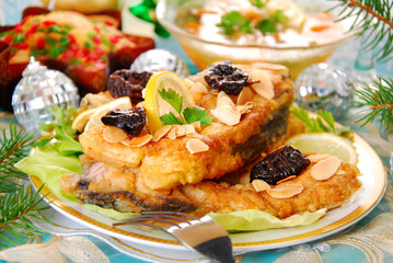 breaded carp with almonds and prune for christmas
