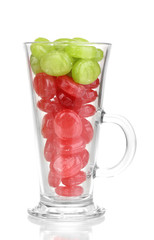 Color candies in glass isolated on white