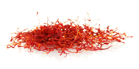 Naklejka premium stigmas of saffron isolated on white background