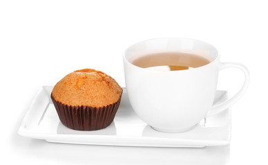 Fresh muffin with tea isolated on white