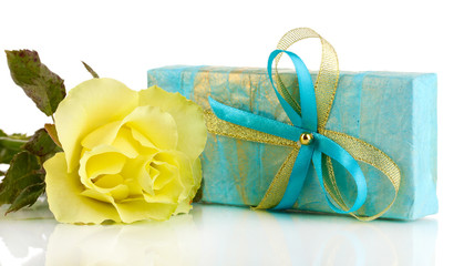 Beautiful yellow rose with wonderful gift in blue box isolated