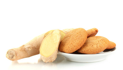Ginger cookies with fresh ginger root isolated on white