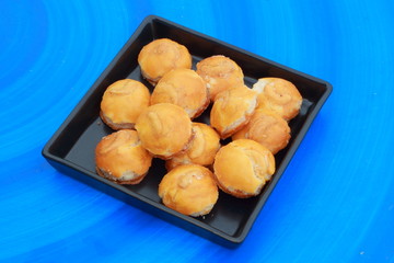 Cookies, cashew, black plate