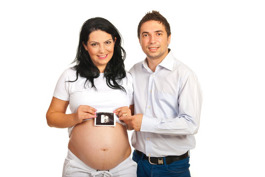 Happy Parents Holding Baby Sonogram