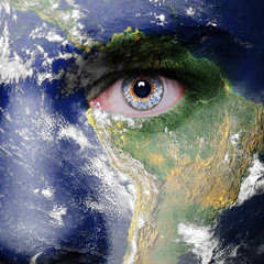 Obraz premium Earth painted on face. Elements of this image furnished by NASA
