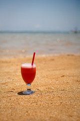 Fresh fruit cocktail on a tropical island beach