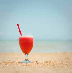 Fresh fruit cocktail on a tropical island beach