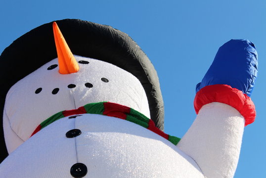 Waving snowman at the Christmas parade