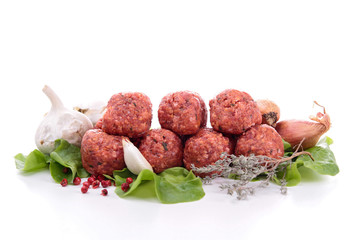 raw meatball on white
