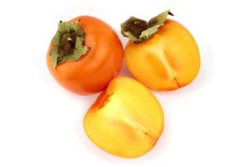 Persimmon or kaki fruit on white background.