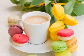 cup of coffee with macaroons