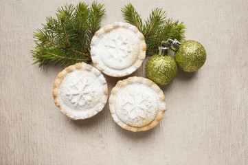 Christmas short crust pastry mince pies on golden background