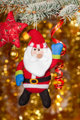 christmas santa greeting on fir tree branch