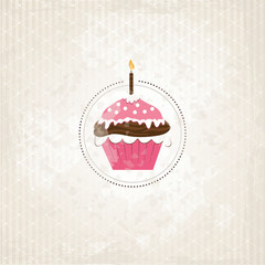 Cupcake mit Kerze auf Grunge Hintergrund