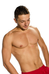 Fototapeta premium Muscular man looking down