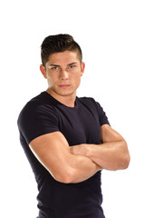 Muscular man with folded arms