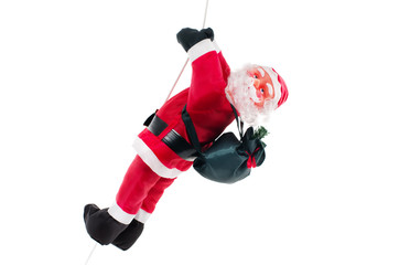 Santa claus doll climbing on rope