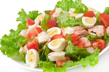 fresh salmon salad, lettuce and quail eggs