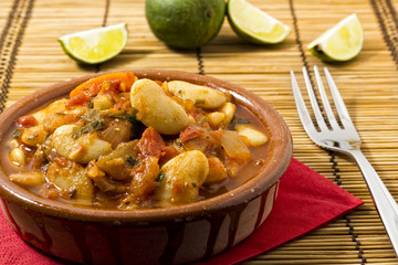 Beans with a tomato based vegetable sauce