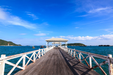 Wooden walk bridge to the sea