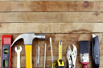 Assorted carpentry work tools on wood, Copy space 