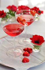 Valentine's day decor with cocktails and chocolate hearts