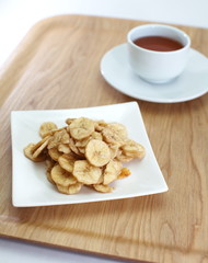 Banana chips with tea