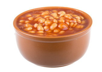 Marinated haricot beans in tomato sauce with shallots on a plate