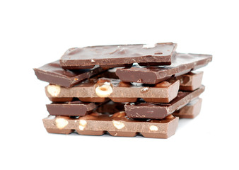 pieces of milk chocolate with nuts on white