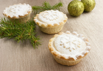 Christmas short crust pastry mince pies on golden backround