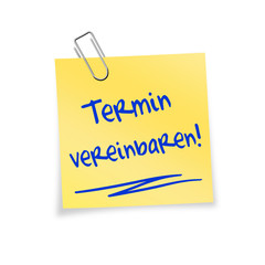 Gelber Notizzettel mit Büroklammer - Termin vereinbaren!